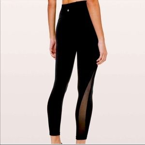 Lululemon mesh sides, high-rise yoga pants. Size2. No holes or stains - worn 2x!
